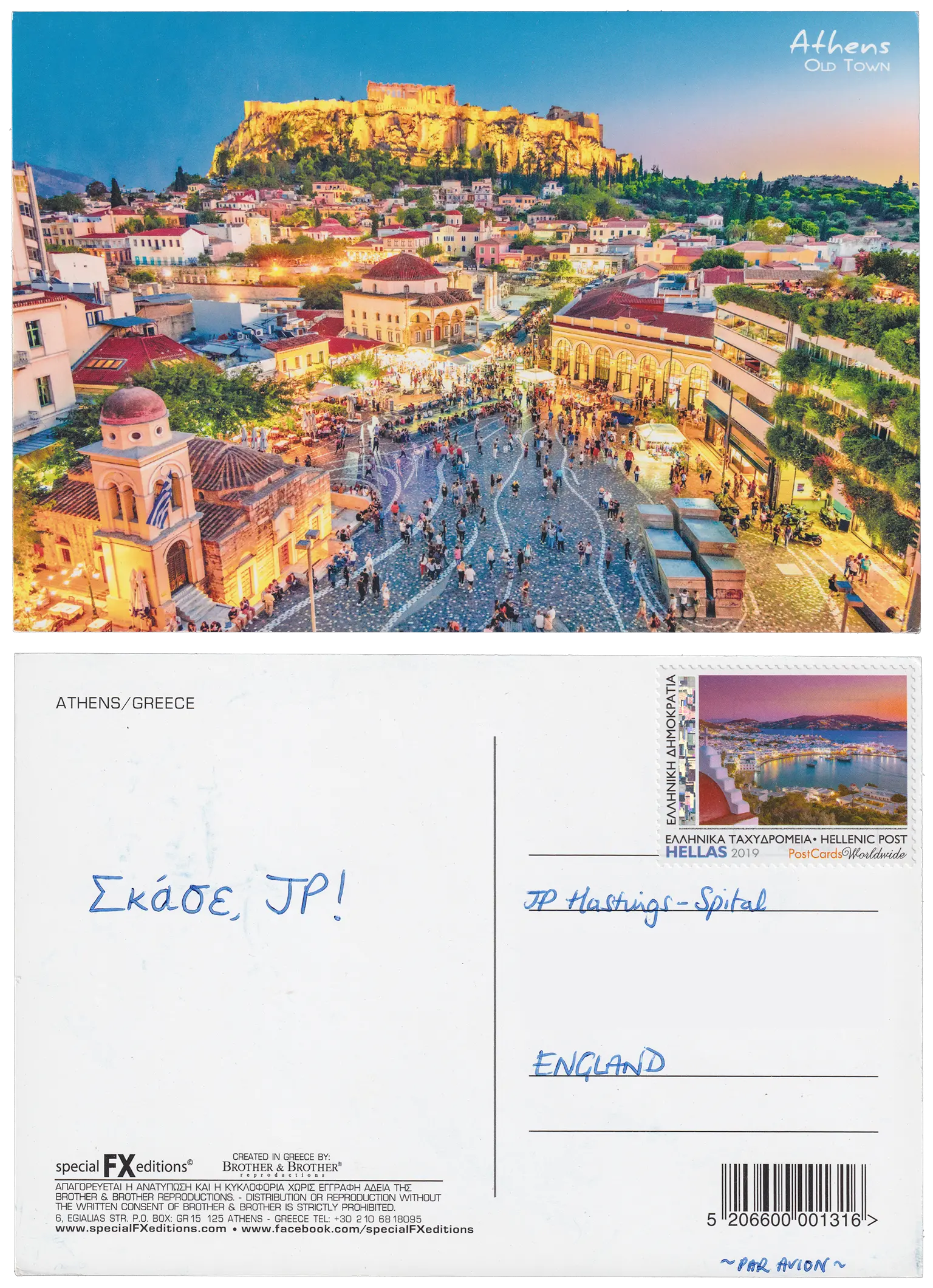 Both sides of a postcard. On the front: A view of Athens' Old Town at dusk, towards the Acropolis. The town's lights glow a golden yellow, as do the lights illuminating the Acropolis itself. On the back: Σκάσε, JP!